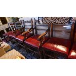 A set of six 20th century Heals and Co. oak dining chairs with stud bound red leather upholstered