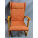 A 20th century Knoll Antimott teak rocking chair.