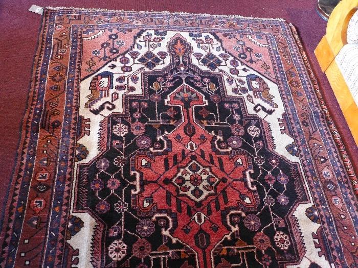 A fine North West Persian Tafresh rug, 240cm x 157cm, on central diamond medallion on an ivory field