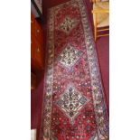 A fine North West Persian Malayer runner, 285cm x 85cm, triple pole medallion with repeating