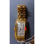 A Cartier 18k yellow gold 'Tank Americaine' ladies wristwatch, quartz movement, the white dial