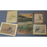 Three Japanese woodblock prints, depicting townscapes and aristocratic figures, together with a