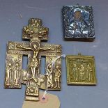 A Russian brass icon depicting the crucifixion of Jesus Christ, H. 16cm, together with a small