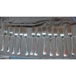 Twelve Walker & Hall silver forks, rattail pattern, hallmarked Sheffield, total weight approx. 26.