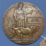 A WWI memorial plaque / Death Penny awarded to Edward Brownell, 12cm diameter