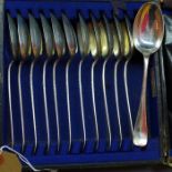 Twelve Walker & Hall silver dessert spoons, rattail pattern, Sheffield 1933-36, approx. 20 troy