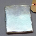 A Mappin and Webb silver cigarette case with engine turned design and dated 1915.