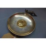 A silver coin dish with moulded fox and central King Edward Coronation coin, hallmarked Chester,