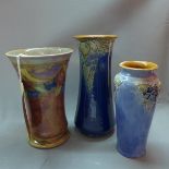 Three Royal Doulton vases.