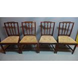 A set of four 19th century mahogany dining chairs with tapestry upholstered drop in seats.