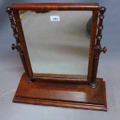 A 19th century mahogany table top swing mirror.