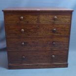 A Victorian mahogany chest of two over three long drawers, raised on stepped base. H-102 W-108 D-