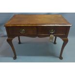 An 18th century walnut side table, with two drawers, raised on cabriole legs. H-72 W-97 D-53