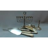 A silver Menorah, having Star of David finial, bears makers mark for A. Taite & Sons Ltd, London,