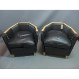 A pair of Art Deco style veneered satinwood tub chairs with black leather upholstery.