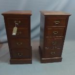 A pair of Edwardian mahogany pedestal chests, with four drawers, raised on stepped base. H-91 W-41