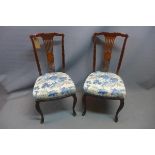 A pair of Edwardian mahogany chairs