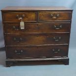 A 19th century mahogany chest of two over three long drawers, raised on bracket feet. H-101 W-111