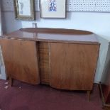 A 1950's figured walnut sideboard with two doors raised on splayed legs. H-92 W-137 D-49cm