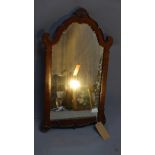 A Georgian style mahogany mirror. 77x45cm