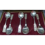 A cased set of six commemorative silver spoons, the finials embossed with musical cherubs - 'The