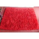 A Gooch Oriental Contemporary red woolen shag pile carpet, 'Yeti' range. 240 x 171cm