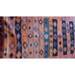 A fine North West Persian Bidgar Kilim, 263cm x 133cm, repeating stylised geometrical motifs on a