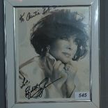 A signed Elizabeth Taylor photograph 24cm x 19cm