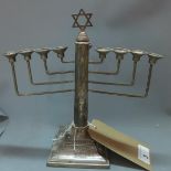 A silver menorah, having nine branches and Star of David finial, A. Taite & Sons Ltd (probably),