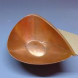 A Tapio Wirkkala copper bowl, by Kultakeskus Oy, Finland, biomorphic form with swirling design,