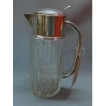 A glass and silver plated lemonade jug, H. 31cm