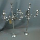 A pair of chrome four branch candelabra, H. 99cm