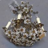 A French gilt metal and faceted glass six branch chandelier, having floral design