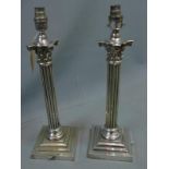 A pair of silver plated Corinthian column table lamps, H. 45cm