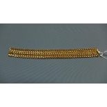 A ladies 18ct yellow gold bracelet, marked 750, approx 35g