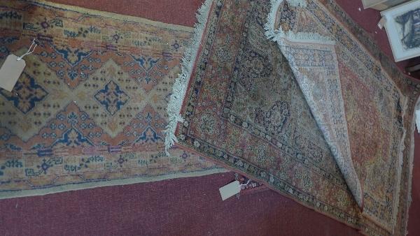 A collection of four Persian rugs, various sizes
