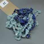 A lapis lazuli necklace, together with a aquamarine necklace, (2)