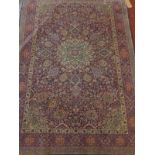 A Persian Kashan carpet, signed, 185 x 122cm