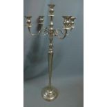 A large floor standing four branch chrome candelabra, H. 140cm