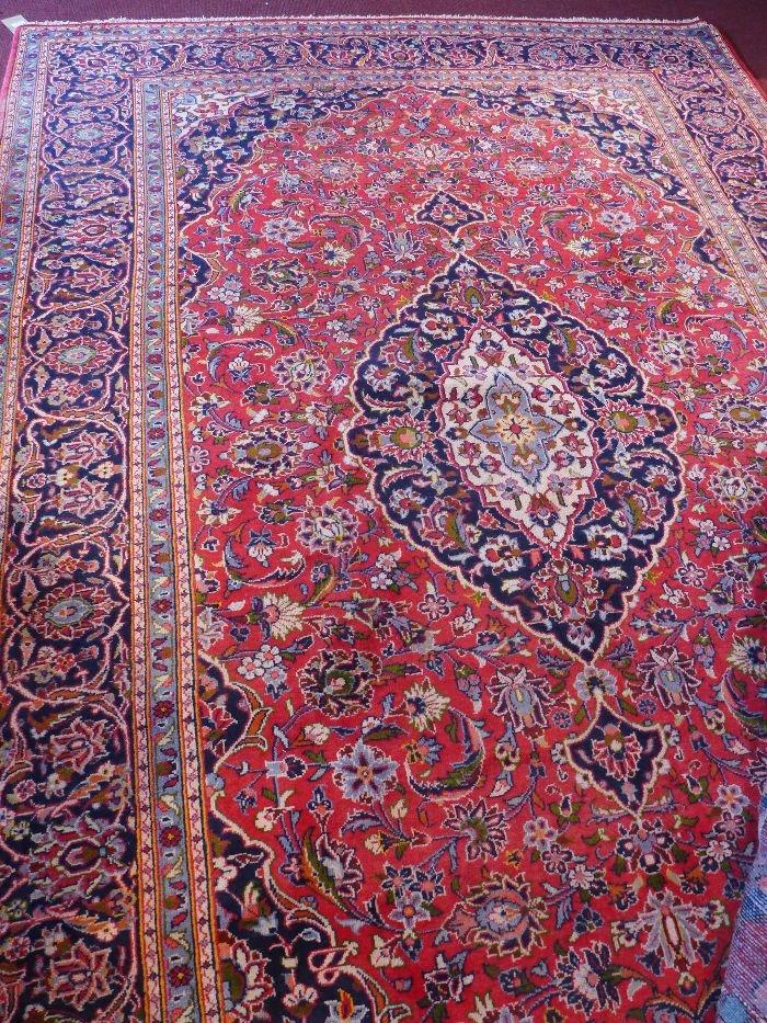 A fine Central Persian Kashan carpet, 325cm x 215cm, central Horal medallion on a rouge field within