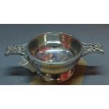 A boxed Scottish Hebridean Spirit cruise hip pattern pewter quaiche, the lugs with Celtic design,