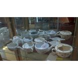 A collection of eight porcelain feeding cups, of various sizes and forms, (16)