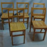 A set of five vintage oak child's chairs