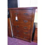 A teak chest of drawers, H.99 W.141cm