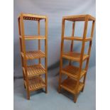 A pair of teak four tier whatnot's, H.140 W.37 D.37cm