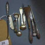A silver and mother of pearl pen knife, together with four silver spoons and silver handled boot
