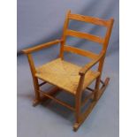 An Arts and Crafts style rocking chair