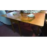 A 20th century teak drop leaf table