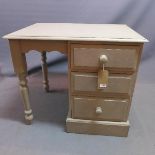 A grey painted knee hole desk, with three drawers, H.76 W.85 D.60cm