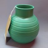 A 1930's Keith Murray, Wedgwood, green glazed vase, H.16cm